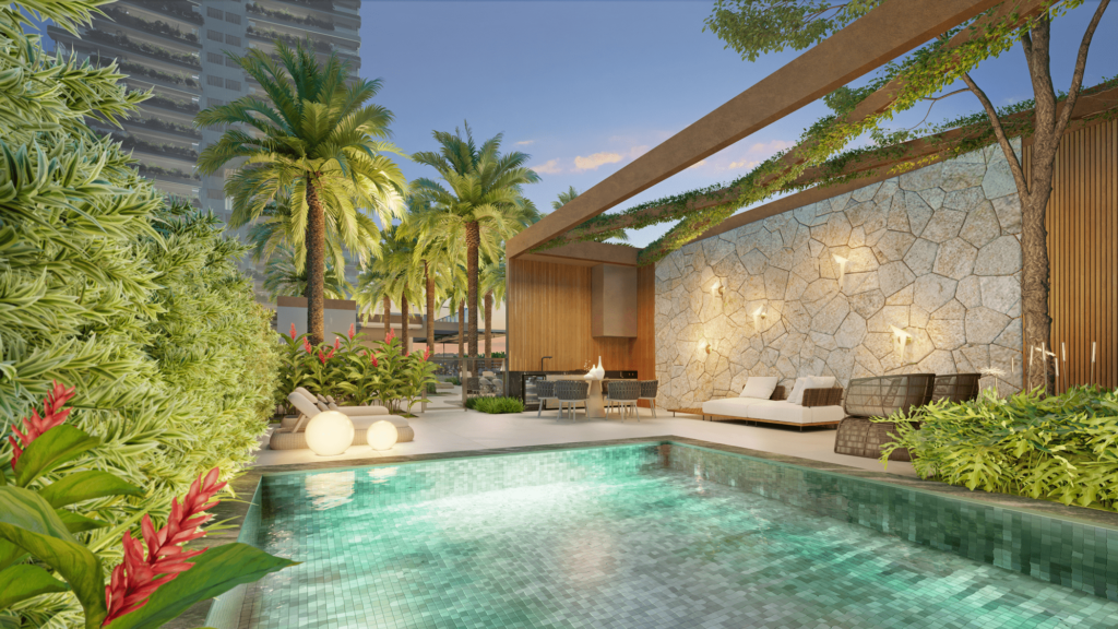 Área externa com piscina descoberta e espaço lounge privativo do Casa Éden by YOO East, rodeada por vegetação tropical